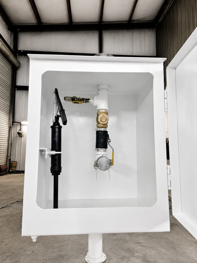 Remote fill spill prevention cabinet for an above ground storage tank