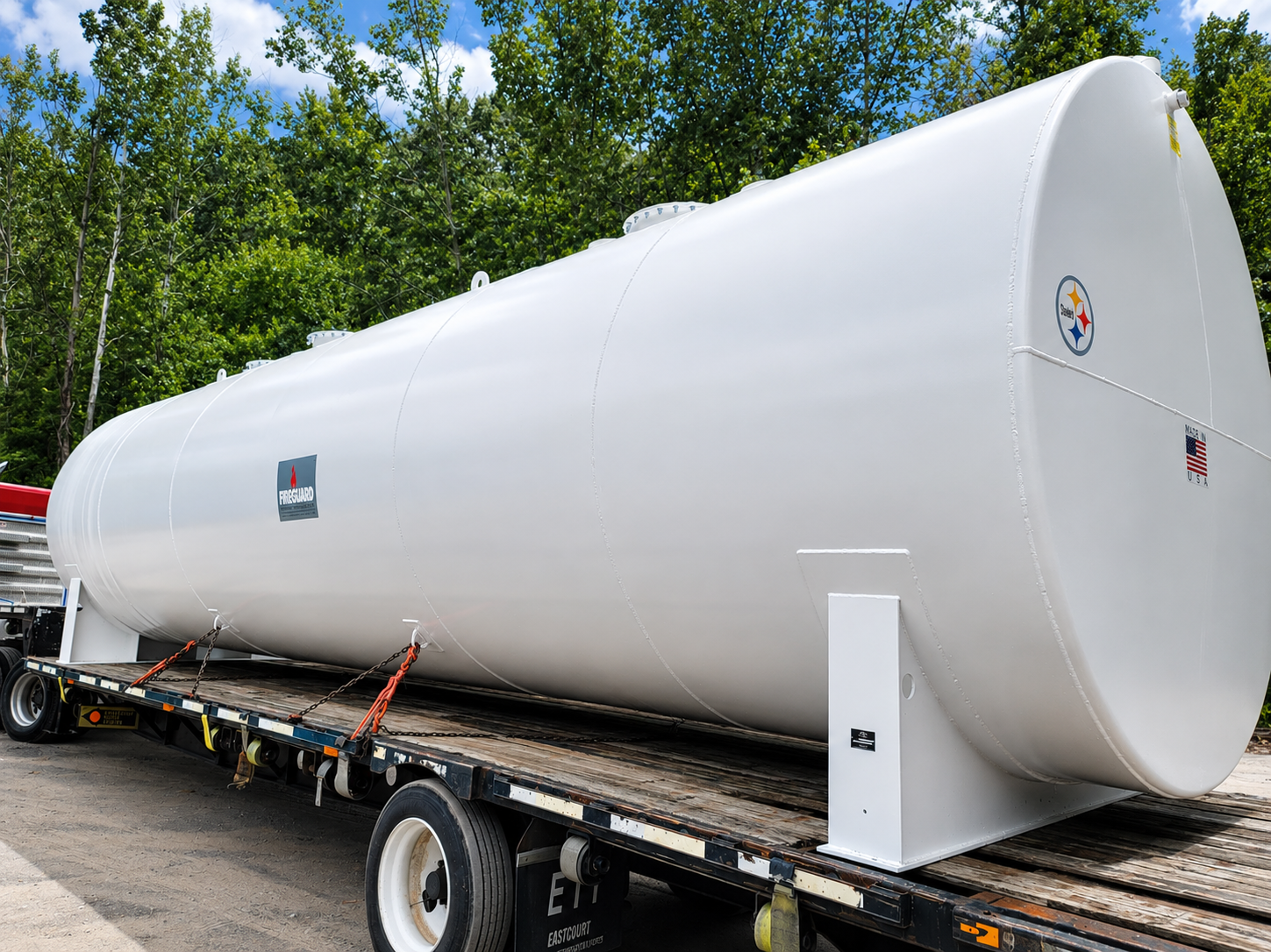 UL 2085 ast secured to a flatbed trailer for delivery
